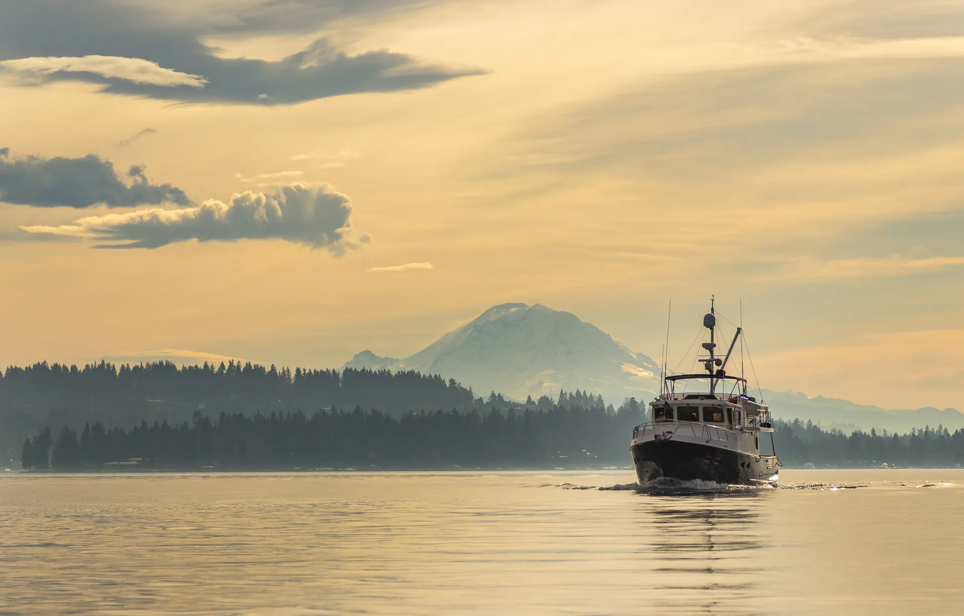 Selene trawler cruising the Pacific Northwest at golden hour